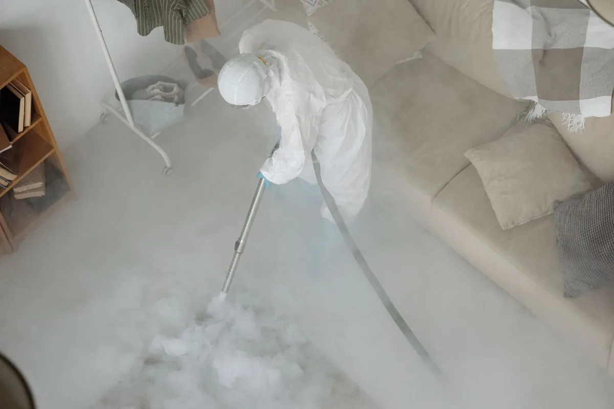 Biohazard cleanup technician in protective equipment, Goldenrod, FL